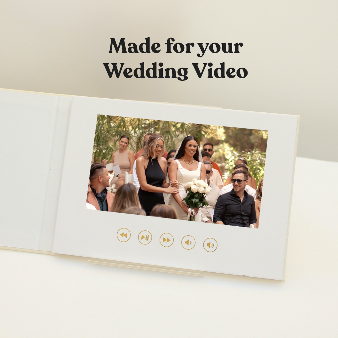 Our Wedding Video Book closed showing premium linen hardcover — wedding video keepsake gift