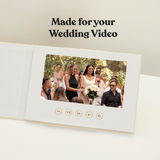 Our Wedding Video Book closed showing premium linen hardcover — wedding video keepsake gift
